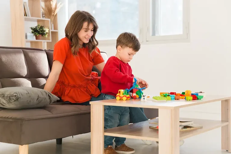 high-angle-mom-watching-son-while-playing